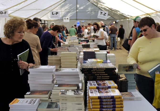 Festival visitors peruse a variety of books for sale Saturday, November 2, 2013 at the 10th Annual Louisiana Book Festival in Downtown Baton Rouge.