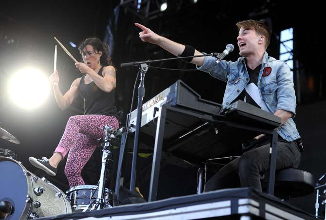 Matt Johnson (right) and Kim Schifino, the two members of Matt &amp; Kim, get the crowd hyped during their set on the Ritual Stage on Sunday Nov. 3, 2013 at the 2013 Voodoo Music + Arts Experience.