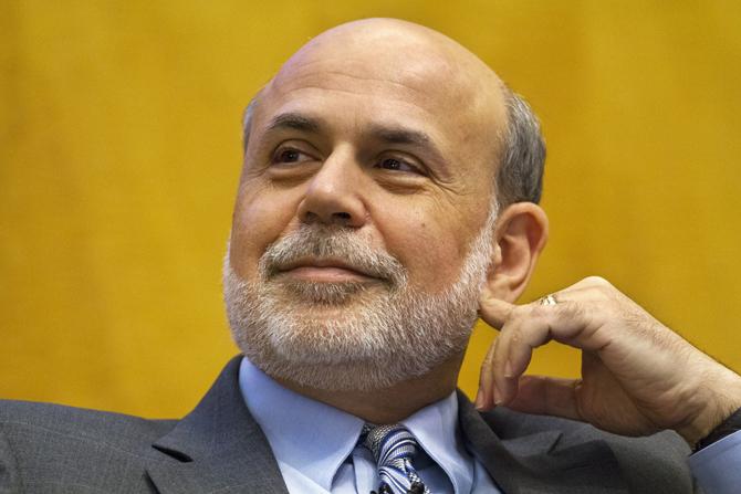 Federal Reserve Chairman Ben Bernanke listens while participating in a panel at the International Monetary Fund (IMF) in Washington Friday, Nov. 8, 2013, on "The Crisis as a Classic Financial Panic." Bernanke said the Federal Reserve is drafting rules to close large insolvent banks without bringing down the broader financial system, one of many steps regulators must take to prevent another financial crisis. (AP Photo/Jacquelyn Martin)