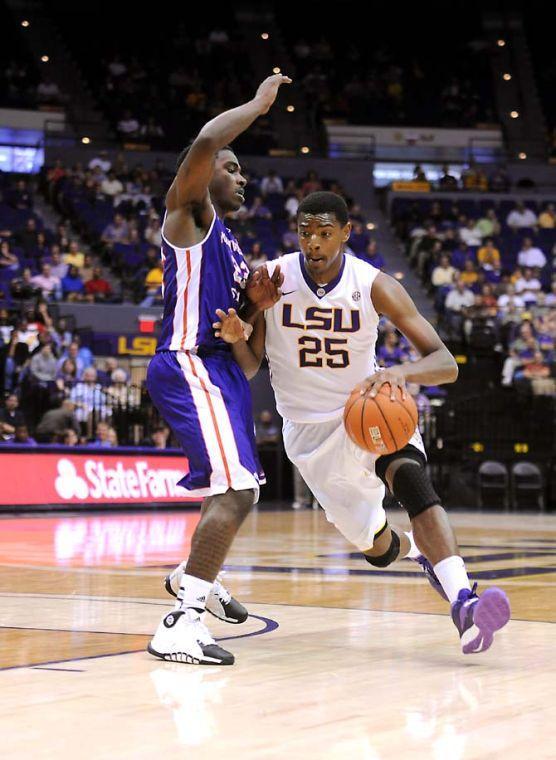 LSU freshman forward Jordan Mickey (25) drives toward the basket Saturday, Nov. 16, 2013 during the Tigers' 88-74 victory against Northwestern State in the PMAC.