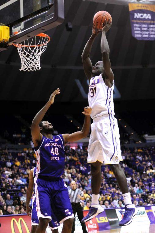 LSU junior forward John Odo (31) attempts to score Saturday, Nov. 16, 2013 during the Tigers' 88-74 victory against Northwestern State in the PMAC.