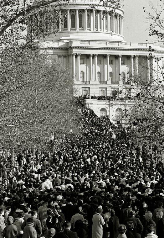 FILE - In this Sunday, Nov. 24, 1963 file photo, mourners form a long line as they assemble in front of the Capitol to pay their respects to slain President John F. Kennedy in Washington. (AP Photo/File)