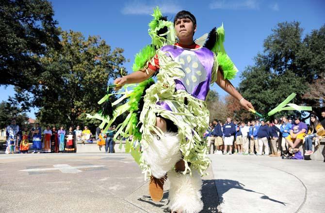 Dakota Daigle, a jingle fancy dancer, performs Wednesday, Nov. 13, 2013 at the Native American Dance Demo in Free Speech Plaza.