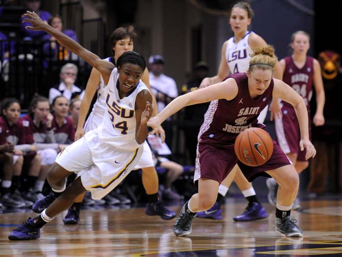 LSU junior guard DaShawn Harden (24) fights for the ball Sunday, Nov. 10, 2013 during the Tigers' 80-64 victory against St. Joseph's University in the PMAC.