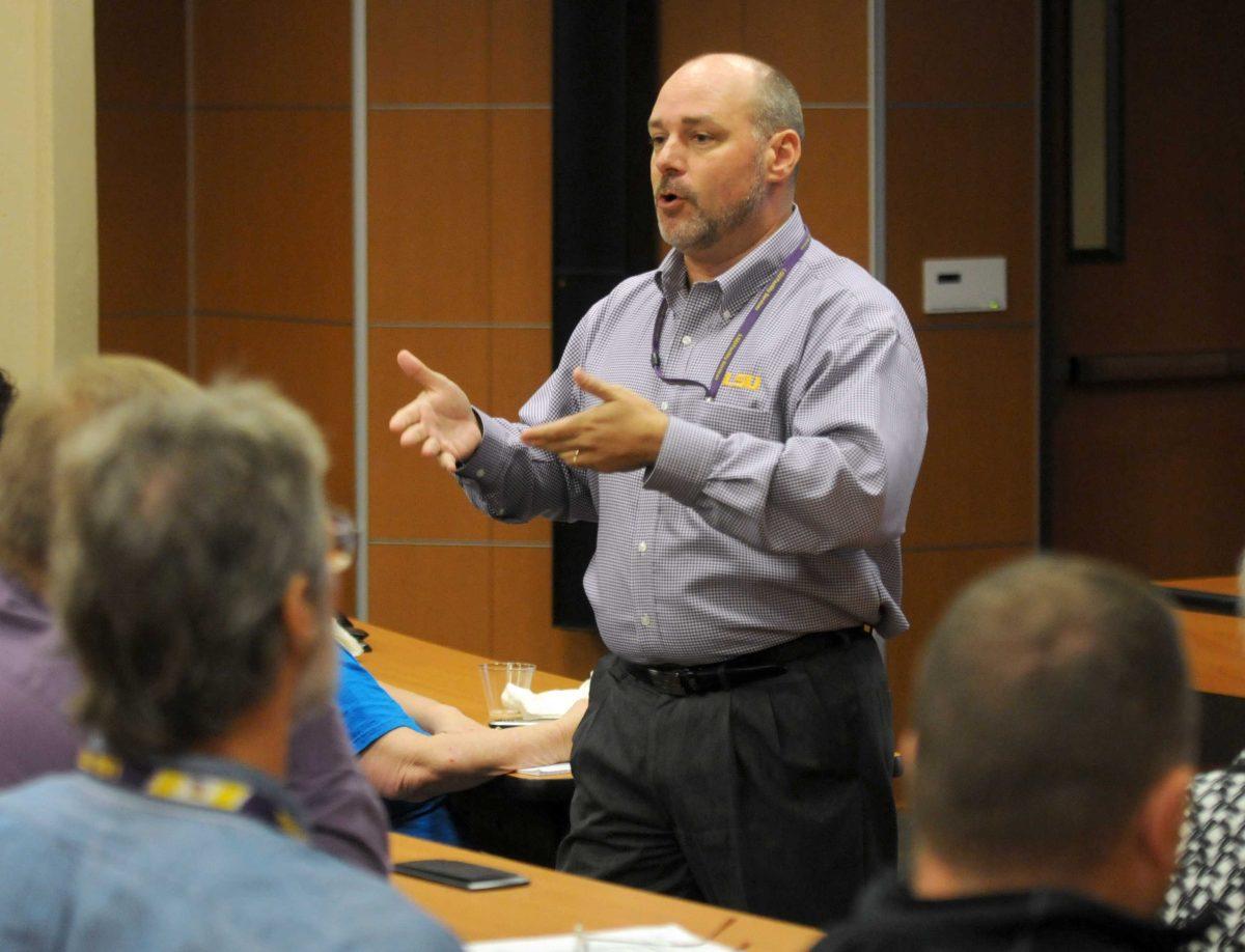 Associate Executive Director of Facility Services David H. Maharrey, Jr. answers questions during the Building Coordinators meeting on Thursday, Nov. 21, 2013 in the Capital Chambers room in the LSU Student Union.