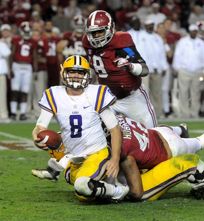 Alabama junior linebacker Adrian Hubbard sacks LSU senior quarterback Zach Mettenberger (8) on Saturday, Nov. 9, 2013 during the Tiger's 38-17 loss to the Alabama Crimson Tide at Bryant-Denny Stadium in Tuscaloosa, AL.