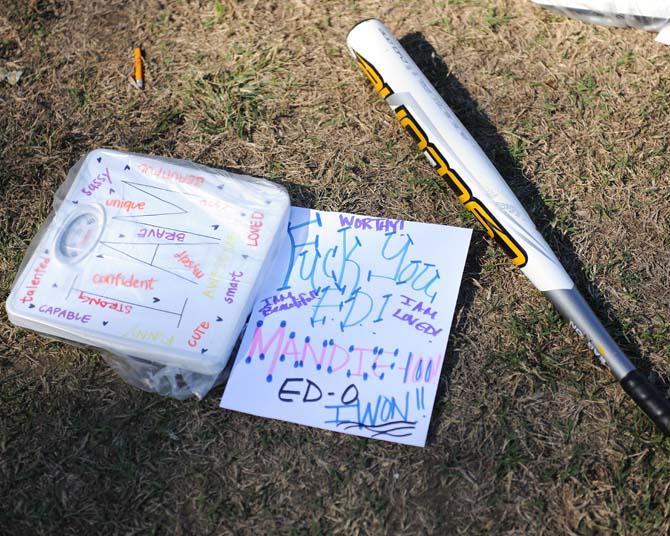 Scales with body affirming messages scatter the Parade Grounds on Wednesday, November 13, 2013 at the Southern Smash event.