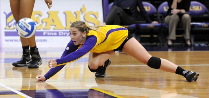 LSU sophomore outside hitter Katie Lindelow (7) dives for the ball Friday, Nov. 1, 2013 during the Tiger's 3-1 loss to Florida Gators in the PMAC.