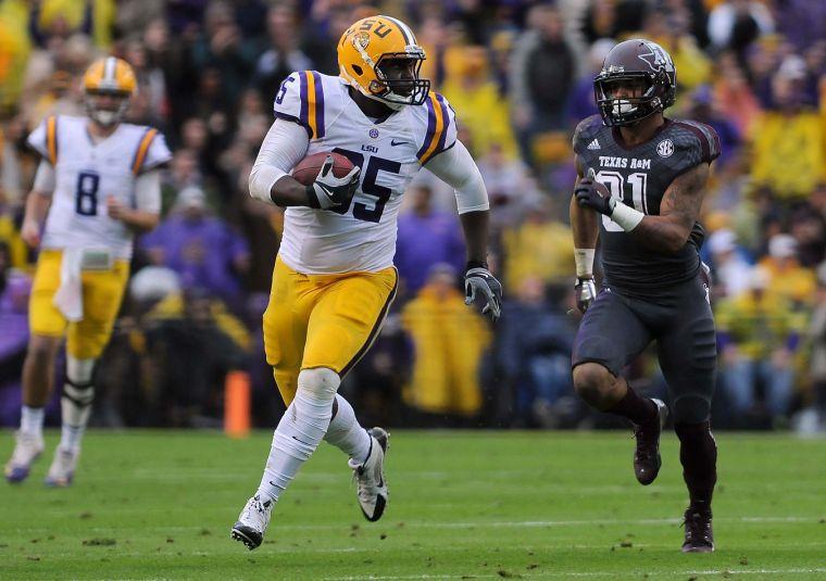 LSU tight end Dillon Gordon (85) runs down the field Saturday Nov. 23, 2013 during the Tigers' 34-10 victory against Texas A&amp;M in Tiger Stadium.