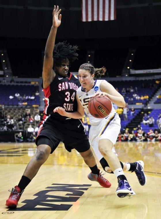 LSU sophomore guard Jeanne Kenney (5) moves past a SDSU defender March 18, 2012 during the Tigers' 64-56 NCAA tournament victory in the PMAC.