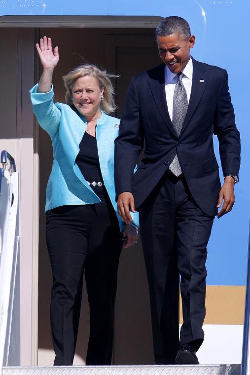 Sen. Mary Landrieu, D-La., waves as she arrives with President Barack Obama aboard Air Force One at Louis Armstrong New Orleans International Airport, Friday, Nov. 8, 2013. The president traveled to the Gulf Coast region to visit the Port of New Orleans to make a case that more exports equal more jobs. After New Orleans he will go to Miami area for three Democratic fundraisers. (AP Photo/Jonathan Bachman)