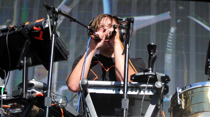 Robert DeLong screams into microphones during his set on the Le Plur Stage on Sunday Nov. 3, 2013 at the 2013 Voodoo Music + Arts Experience.