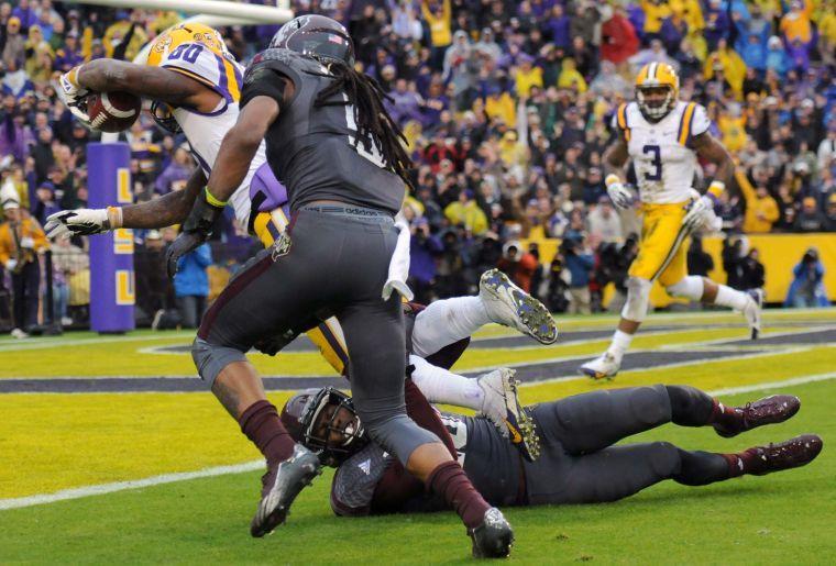 LSU junior wide receiver Jarvis Landry (80) scores a touchdown Saturday Nov. 23, 2013 during the Tigers' 34-10 victory against Texas A&amp;M in Tiger Stadium.