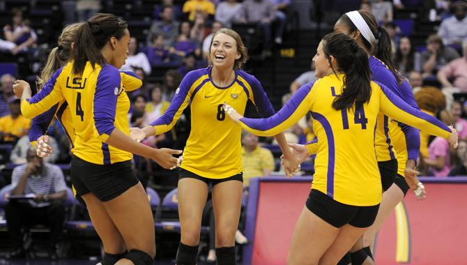 LSU woman's volleyball team celebrates after a point Friday, Nov. 1, 2013 during the Tiger's 3-1 loss to the Florida Gators in the PMAC.