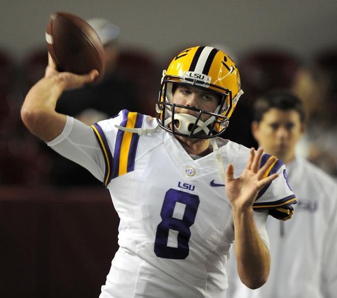 LSU senior quarterback Zach Mettenberger (8) warms up Saturday, Nov. 9, 2013 before the Tiger's 38-17 loss to the Alabama Crimson Tide at Bryant-Denny Stadium in Tuscaloosa, AL.