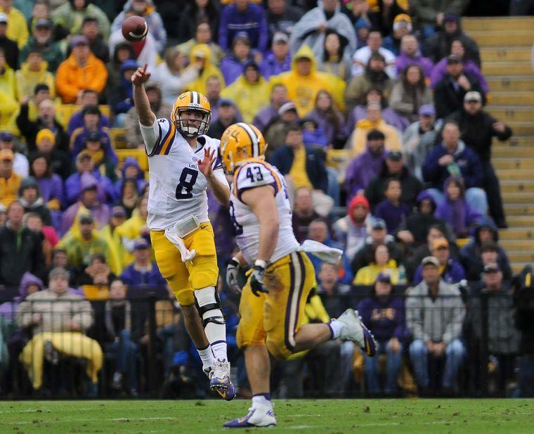 LSU senior quarter back Zach Mettenberger (8) throws a pass Saturday Nov. 23, 2013 during the Tigers' 34-10 victory against Texas A&amp;M in Tiger Stadium.