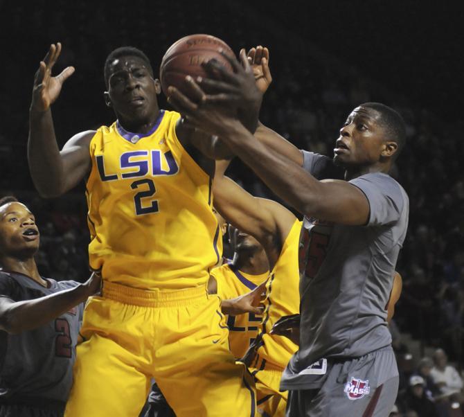 LSU''s Johnny O'Bryant III (2) and Massachusetts' Cady Lalanne, right, vie for a loose ball in the first half of an NCAA college basketball game in Amherst, Mass., Tuesday, Nov. 12, 2013. (AP Photo/The Republican, Mark M. Murray)