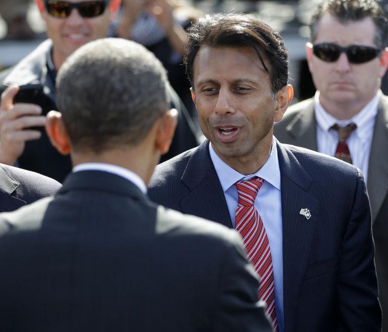 Barack Obama is greeted by Louisiana Gov. Bobby Jindal after speaking at the Port of New Orleans, Friday, Nov. 8, 2013. Obama traveled to the Gulf Coast region to make a case that more exports equal more jobs. After New Orleans he will go to Miami area for three Democratic fundraisers.(AP Photo/Pablo Martinez Monsivais)