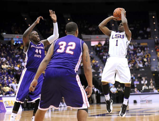 LSU junior guard Anthony Hickey (1) attempts a jump shot Saturday, Nov. 16, 2013 during the Tigers' 88-74 victory against Northwestern State in the PMAC.