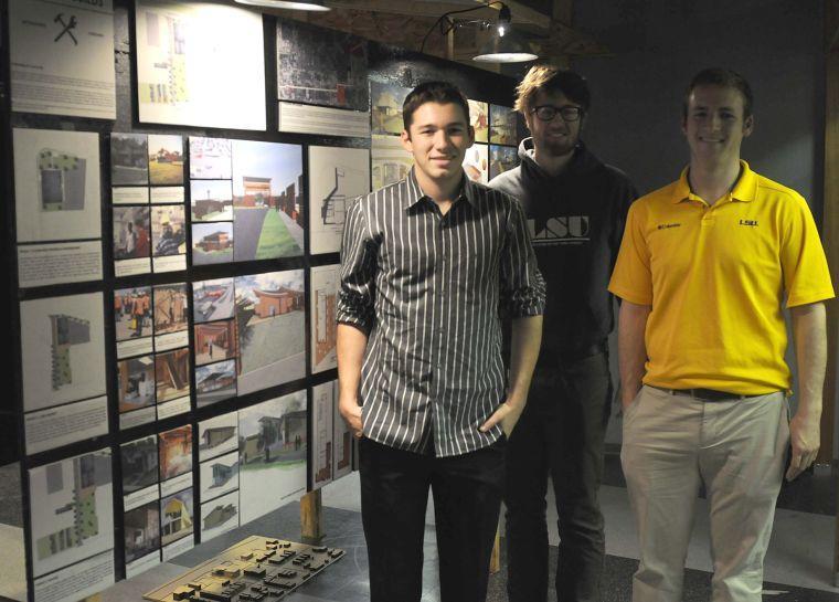 Architecture students Cody Drago, Ryan Zeringue, and Kyle Treloar stand with their proposal Friday Nov. 22, 2013 during White Light Night at Letterman&#8217;s Blue Print and Supply on 4627 Government Street.