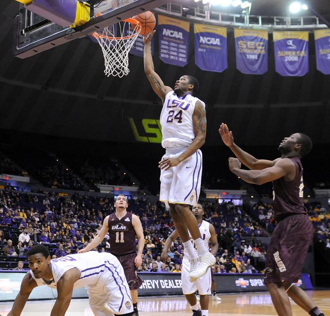 LSU sophomore guard Malik Morgan (24) shoots the ball Dec. 14, 2013 during the Tiger's 61-54 victory against University of Louisiana at Monroe in the PMAC.