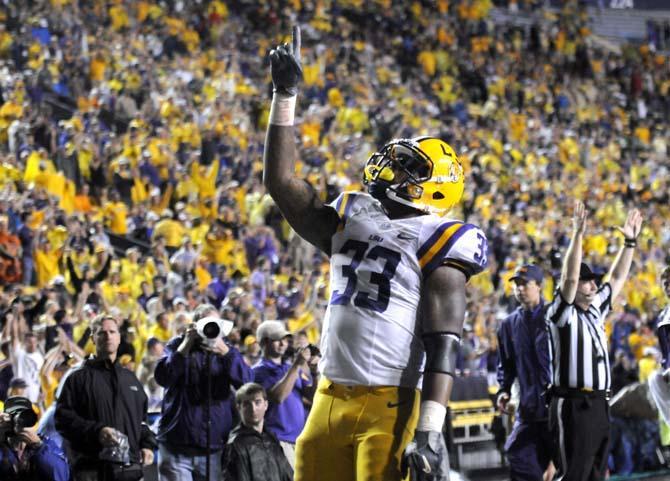 LSU sophomore running back Jeremy Hill (33) celebrates after scoring a touchdown Saturday, Sept. 21, 2013 during the Tigers' 35-21 victory against Auburn in Tiger Stadium.