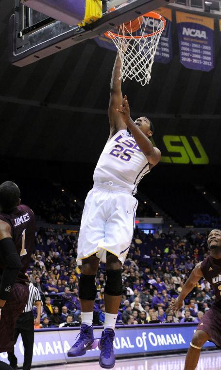 LSU freshman forward Jordan Mickey (25) scores a lay up Dec. 14, 2013 during the Tiger's 61-54 victory against University of Louisiana at Monroe in the PMAC.