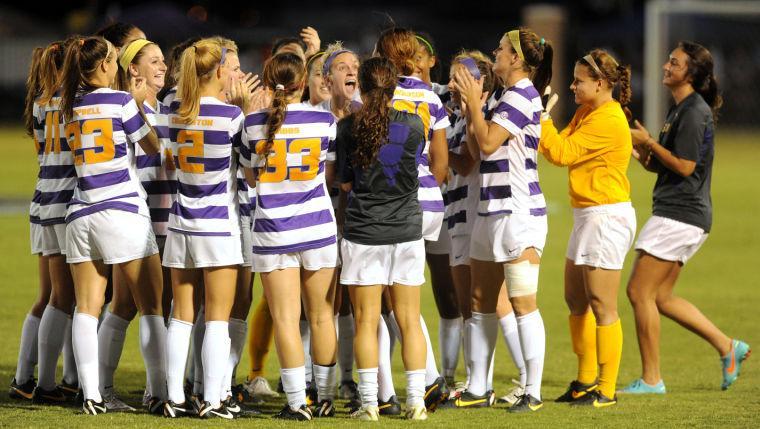The LSU soccer team cheers Friday, Oct. 11, 2013 before the 1-0 victory against Mizzou at the LSU Soccer Stadium.