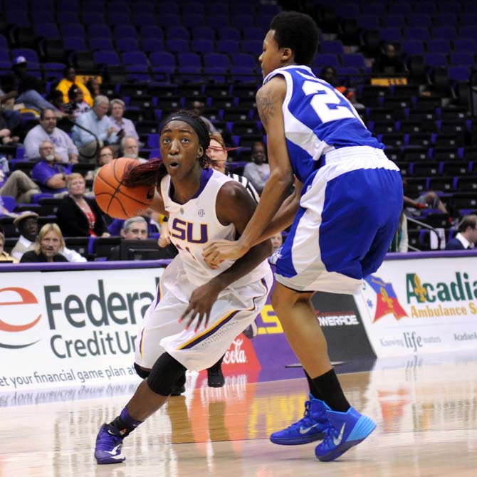 LSU freshman guard Raigyne Moncrief (11) drives toward the basket Wednesday, Nov. 20, 2013 during the Lady Tiger's 73-54 victory against Hampton Lady Pirates in the PMAC.