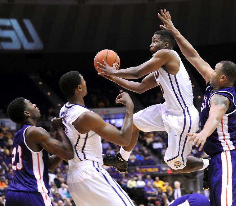 LSU senior guard Andre Stringer (10) leaps toward the basket Saturday, Nov. 16, 2013 during the Tigers' 88-74 victory against Northwestern State in the PMAC.