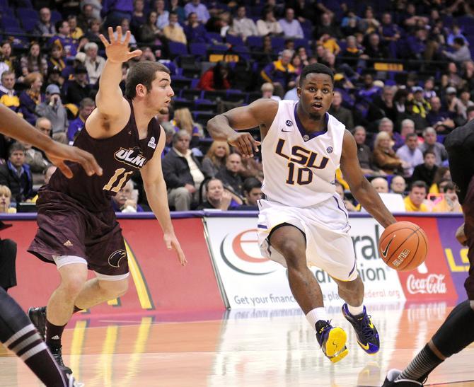 Tigers grind past Warhawks 61-54