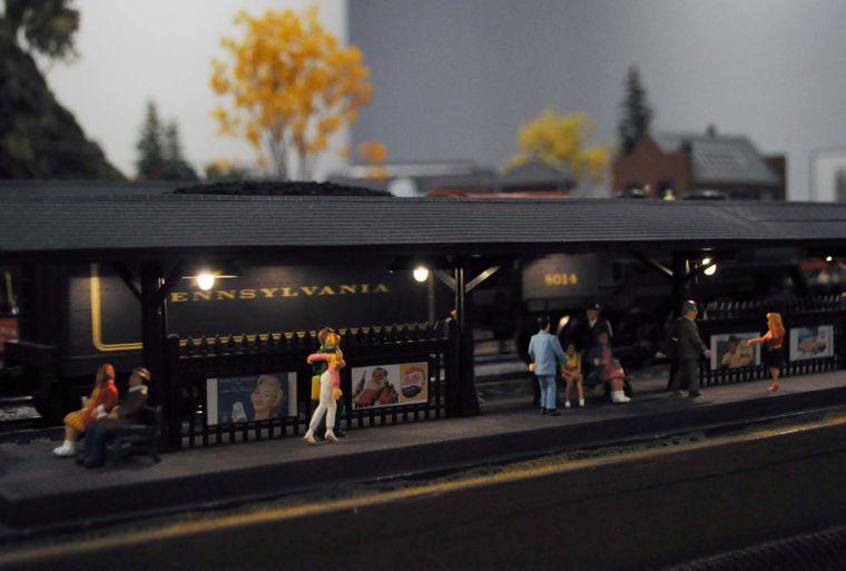 A model train travels around a track created by the Greater Baton Rouge Model Railroaders in the "Getting There" exhibition at the LSU Museum of Art at The Shaw Center for the Arts in downtown Baton Rouge.