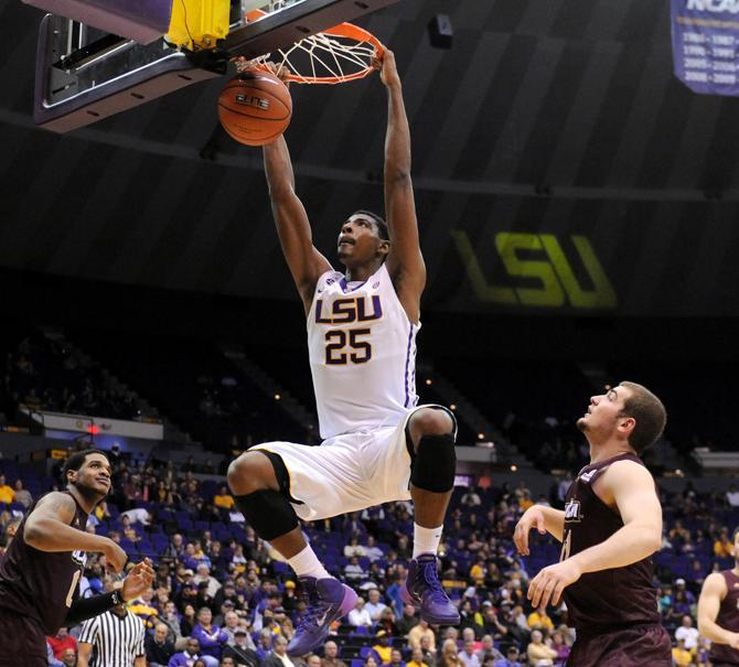 LSU freshman forward Jordan Mickey (25) performs a dunk Dec. 14, 2013 during the Tiger's 61-54 victory against University of Louisiana at Monroe in the PMAC.