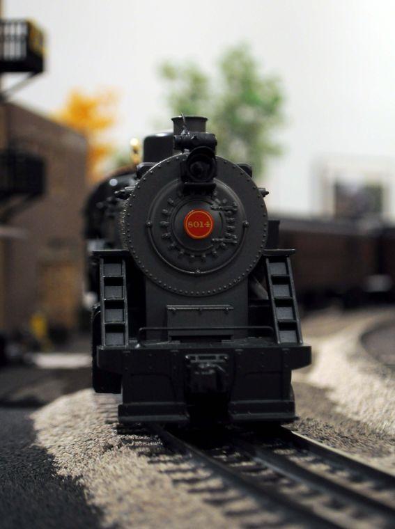 A model train travels around a track created by the Greater Baton Rouge Model Railroaders in the "Getting There" exhibition at the LSU Museum of Art at The Shaw Center for the Arts in downtown Baton Rouge.