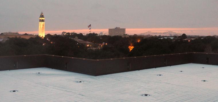 The sun sets Tuesday, Jan. 28, 2013 over Baton Rouge.