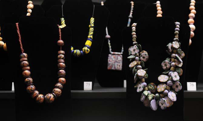 Necklaces made from polymer clay are on display for the Knot Just Beads exhibit by bead and fiber artist Jane Olson-Phillips Sunday, January 26, 2014 at the LSU Textile and Costume Museum located in the Human Ecology Building.