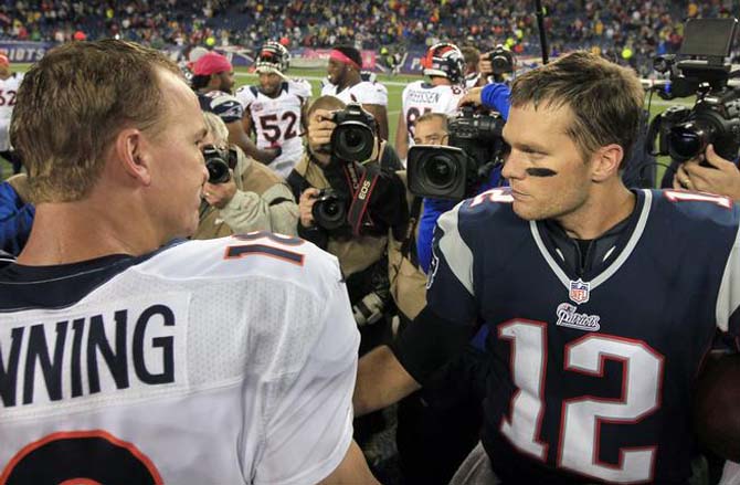 FILE - In this Oct. 7, 2012, file photo, Denver Broncos quarterback Peyton Manning, left, and New England Patriots quarterback Tom Brady, right, speak in the middle of the field after the Patriots beat the Broncos 31-21 in an NFL football game in Foxborough, Mass. Manning and Brady will square off for the 14th time Sunday, Nov. 24, 2013, when the Broncos travel to New England. (AP Photo/Steven Senne, File)