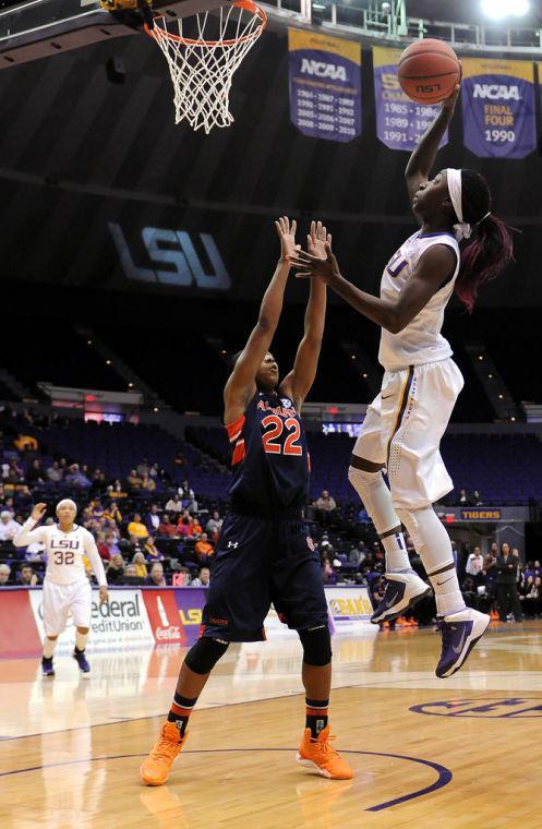 LSU freshman guard Raigyne Moncrief (11) shoots a field goal Thursday, Jan. 23, 2013 during the Lady Tigers' 71-60 victory against Auburn in the PMAC.