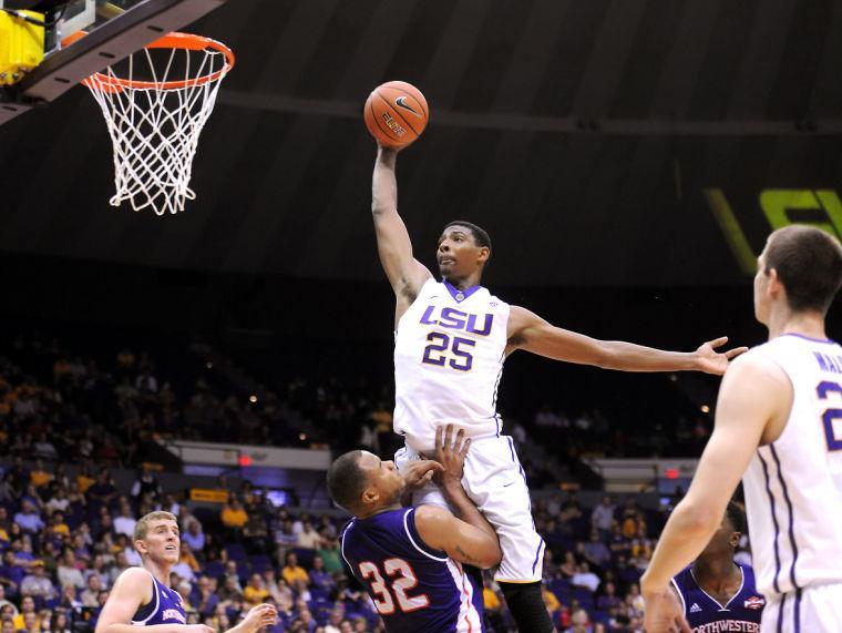 LSU freshman forward Jordan Mickey (25) leaps toward the basket Saturday, Nov. 16, 2013 during the Tigers' 88-74 victory against Northwestern State in the PMAC.