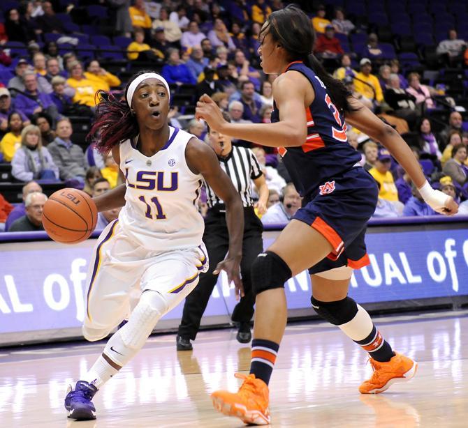 LSU freshman guard Raigyne Moncrief (11) drives toward the goal Thursday, Jan. 23, 2013 during the Lady Tigers' 71-60 victory against Auburn in the PMAC.