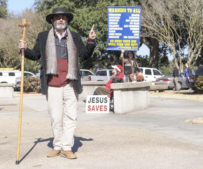 Brother Jed preaches to students Wednesday, Jan. 22, 2014 in Free Speech Plaza.