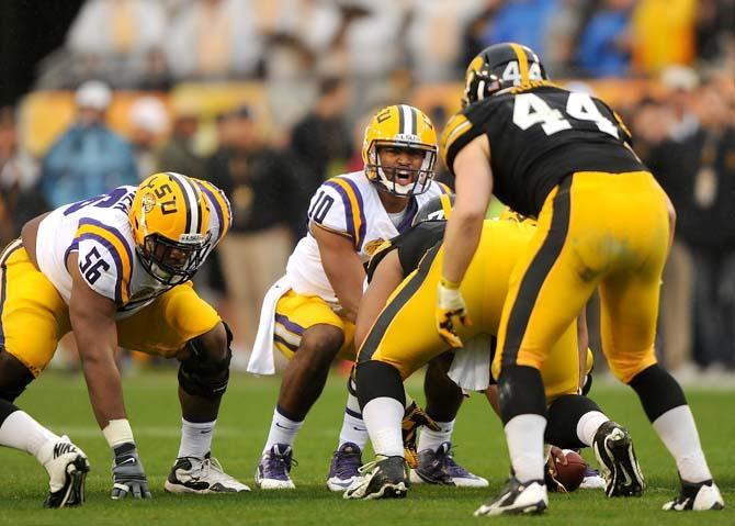 LSU freshman quarterback Anthony Jennings (10) yells to his teammates Wednesday, January 1, 2014 during the Tigers' 21-14 victory against Iowa in the Outback Bowl at Raymond James Stadium in Tampa, Florida.