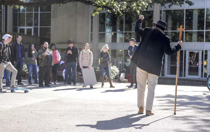 Brother Jed preaches to students Wednesday, Jan. 22, 2014 in Free Speech Plaza.