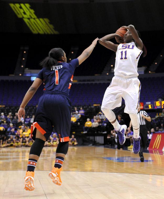 LSU freshman guard Raigyne Moncrief (11) shoots a field goal Thursday, Jan. 23, 2013 during the Lady Tigers' 71-60 victory against Auburn in the PMAC.