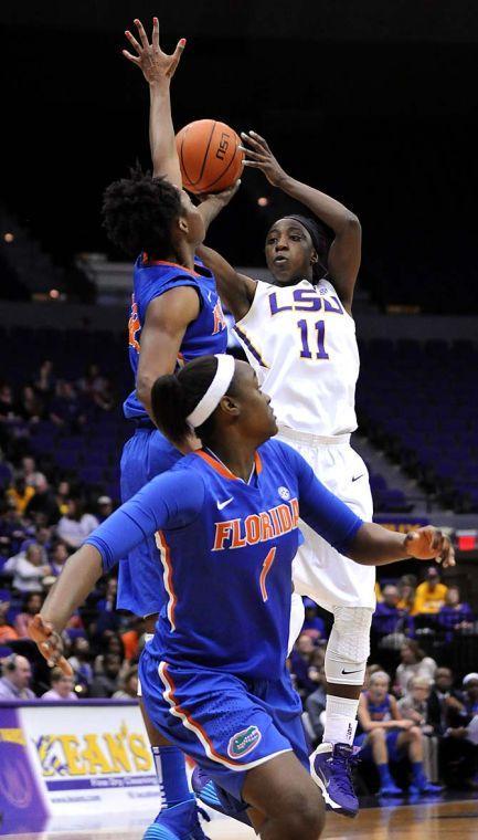 LSU freshman guard Raigyne Moncrief (11) attempts a shot Sunday, Jan. 12, 2014 during the Tigers 82-68 victory against Florida in the PMAC.