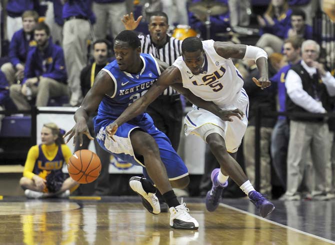 Kentucky freshman forward Julius Randle (30) steals the ball from LSU senior forward Shavon Coleman (5) on Tuesday, Jan. 28, 2014, during the Tigers' 87-82 win against the Wildcats in the PMAC.