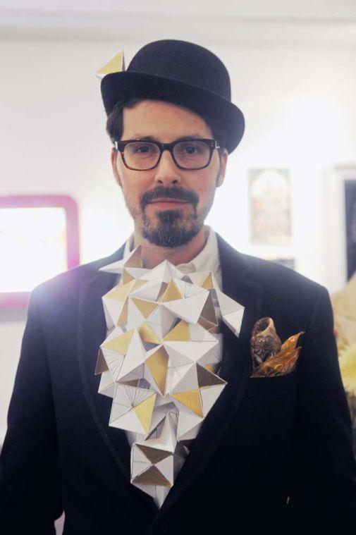 Benjamin Leger poses with his oragami suit Saturday, January 25, 2014 at the Baton Rouge Gallery for contemporary art to present Surreal Salon Six, a national juried exhibition of pop-surrealist and lowbrow art from across America. This year's exhibition features 80 works from 58 artists representing 20 states.