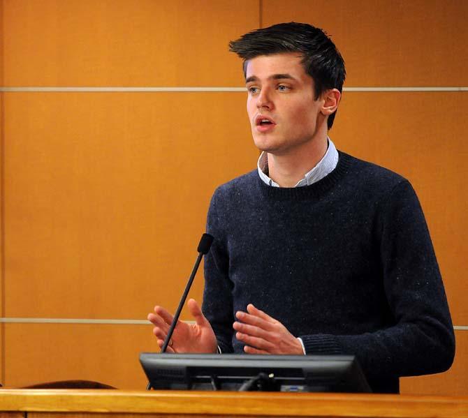 Student Government senator Kevin Muehleman&#160;speaks Wednesday, Jan. 22, 2014 during the SG senate meeting in the Capital Chamber.