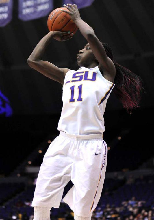 LSU freshman guard Raigyne Moncrief (11) attempts a shot Sunday, Jan. 12, 2014 during the Tigers 82-68 victory against Florida in the PMAC.