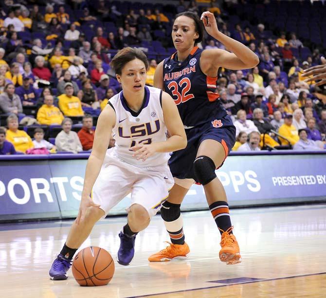 LSU freshman guard Rina Hill (13) drives toward the basket Thursday, Jan. 23, 2014 during the first half of the Tigers' game against Auburn in the PMAC